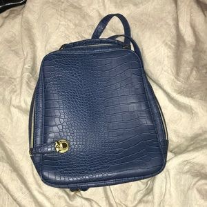 Great shape blue backpack gold trimming